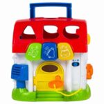 6 colorful sorter blocks for baby 2 modes of play: Fun Sounds and Play Along Tunes Easy grasp key locks and unlocks door Click-clack clock, fun roller, open-shut windows and garage door Light-up buttons with music and flashing lights Retractable handle for carry along fun