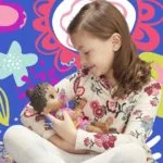Baby Alive Baby Lil Sounds: Interactive Black Hair Baby Doll, Includes Dress and Pacifier - Image 3