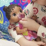 Baby Alive Baby Lil Sounds: Interactive Black Hair Baby Doll, Includes Dress and Pacifier - Image 4