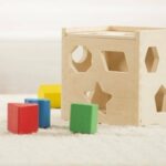 Melissa & Doug Shape Sorting Cube - Classic Wooden Toy With 12 Shapes - Image 5