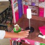 KidKraft Brooklyn's Loft Wooden Dollhouse with 25-Piece Accessory Set, Lights and Sounds - Image 6