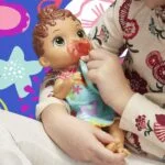 Baby Alive Baby Lil Sounds: Interactive Brown Hair - Image 3