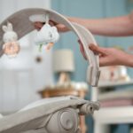 Ingenuity Baby Bouncer with Lights Toy Bar, Vibrations, Tummy Time Pillow & Sounds - Image 6