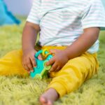 Bright Starts Safari Driver Take Along Toy with Music and Lights-Green - Image 5